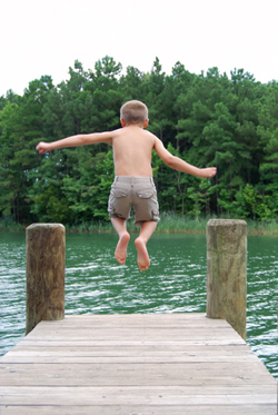 boy-jumping-dock